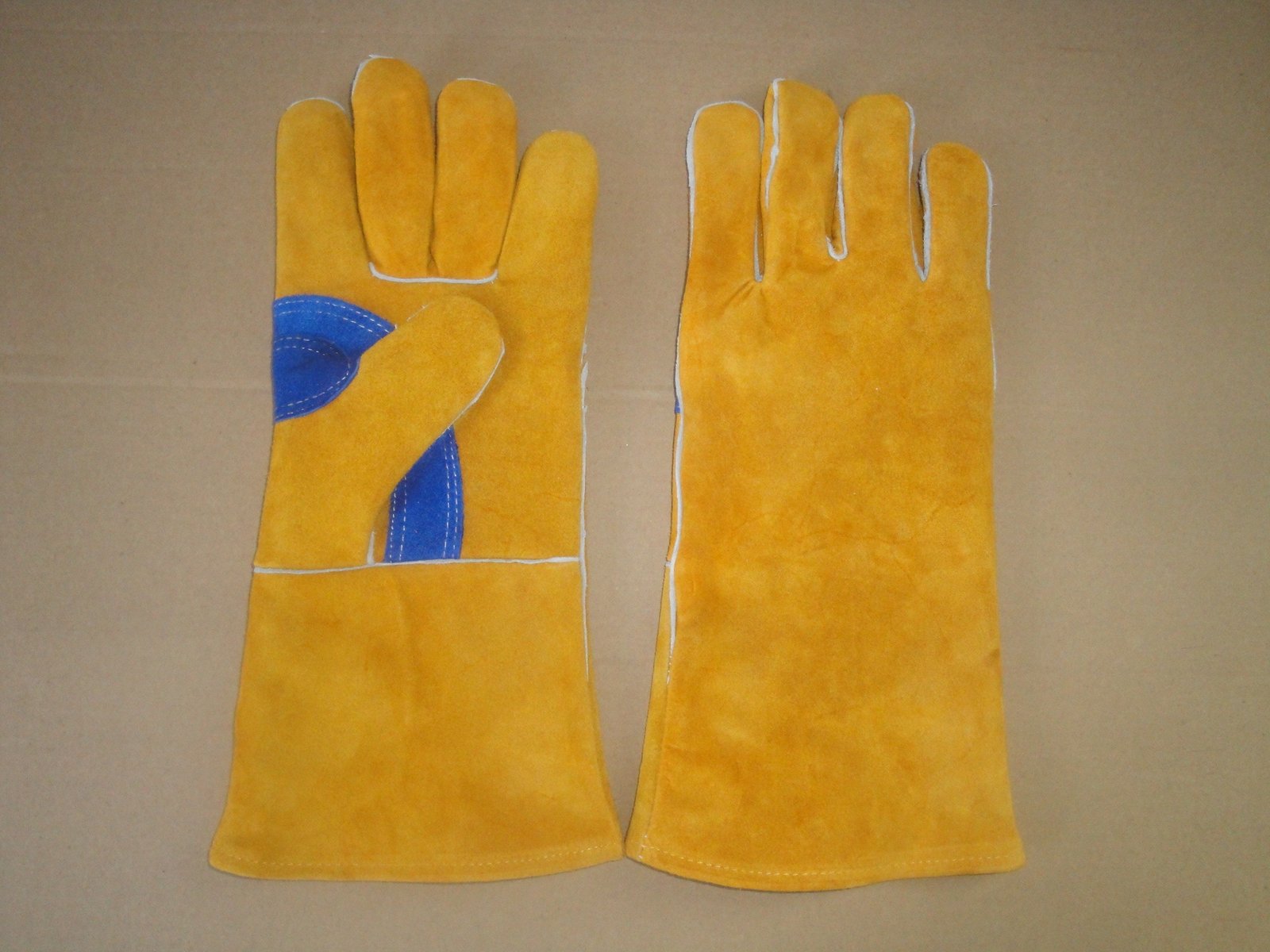Yellow welding gloves, blue thumb patch – Welding gloves